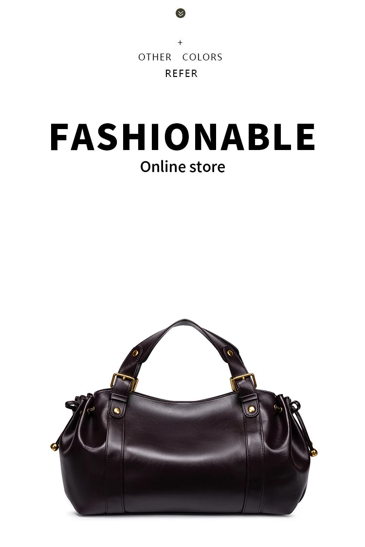 Sac Boston pour femme (collection 2026) – Sac à main souple et épuré de couleur unie, idéal pour le travail, porté épaule ou croisé.