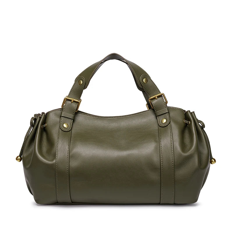 Sac Boston pour femme (collection 2026) – Sac à main souple et épuré de couleur unie, idéal pour le travail, porté épaule ou croisé.