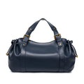 Sac Boston pour femme (collection 2026) – Sac à main souple et épuré de couleur unie, idéal pour le travail, porté épaule ou croisé.