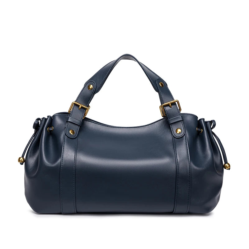 Sac Boston pour femme (collection 2026) – Sac à main souple et épuré de couleur unie, idéal pour le travail, porté épaule ou croisé.