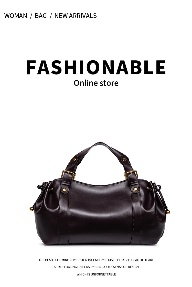 Sac Boston pour femme (collection 2026) – Sac à main souple et épuré de couleur unie, idéal pour le travail, porté épaule ou croisé.