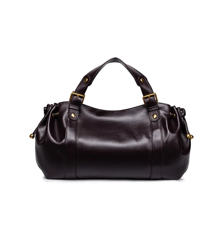 Sac Boston pour femme (collection 2026) – Sac à main souple et épuré de couleur unie, idéal pour le travail, porté épaule ou croisé.
