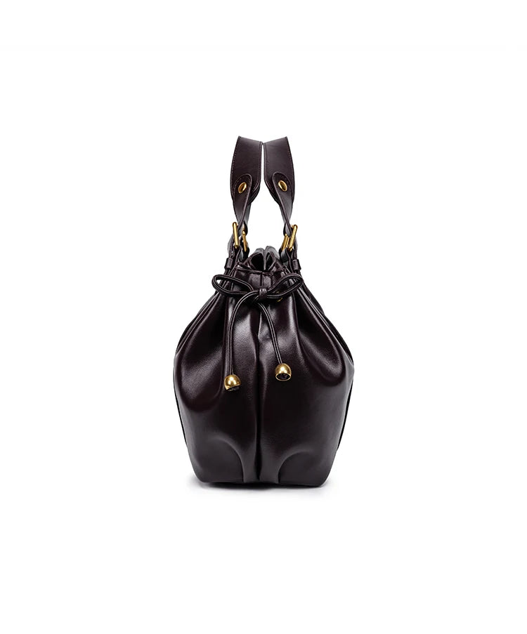 Sac Boston pour femme (collection 2026) – Sac à main souple et épuré de couleur unie, idéal pour le travail, porté épaule ou croisé.